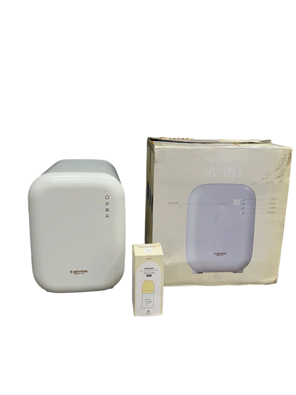 Máy tiệt trùng Heanim mini còn bảo hành (tặng kèm bình sữa Heanim)