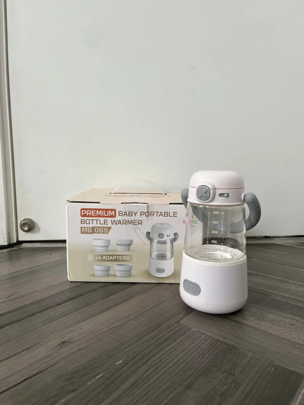 Máy hâm sữa di động cầm tay Moaz bébé MB069 tặng 4 cổ bình (như mới còn bảo hành 12 tháng) - Ảnh 13