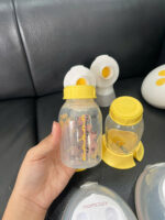 Máy hút sữa điện đôi Swing Maxi Medela kèm cup Momcozy ( no box) - Ảnh 11