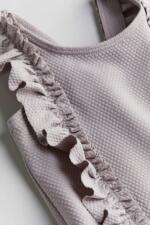 Đồ bơi H&M viền bèo nhún màu tím nhạt( size: 6/9m) tặng kèm váy hoa (size 0/3m) - Ảnh 8