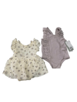 Đồ bơi H&M viền bèo nhún màu tím nhạt( size: 6/9m) tặng kèm váy hoa (size 0/3m)