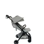 Xe đẩy Nuna TRVL màu be khung đen (kèm cup holder Nuna)