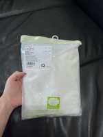 Bodysuit dài tay Uniqlo màu trắng(size 6→9m) - Ảnh 2