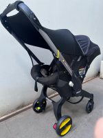 Xe đẩy kết hợp ghế ngồi ô tô Doona màu đen, tặng kèm đệm xe đẩy và miếng lót ô tô (1,8→13,6kg, còn túi đựng) - Ảnh 30