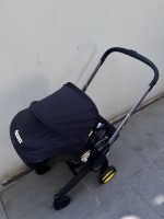 Xe đẩy kết hợp ghế ngồi ô tô Doona màu đen, tặng kèm đệm xe đẩy và miếng lót ô tô (1,8→13,6kg, còn túi đựng) - Ảnh 15