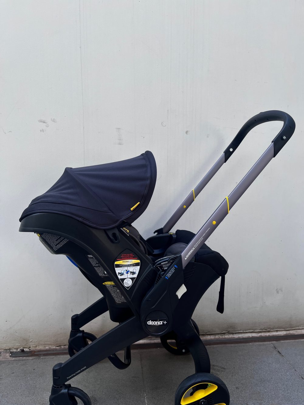 Xe đẩy kết hợp ghế ngồi ô tô Doona màu đen, tặng kèm đệm xe đẩy và miếng lót ô tô (1,8→13,6kg, còn túi đựng) - Ảnh 16