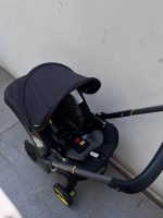 Xe đẩy kết hợp ghế ngồi ô tô Doona màu đen, tặng kèm đệm xe đẩy và miếng lót ô tô (1,8→13,6kg, còn túi đựng) - Ảnh 18
