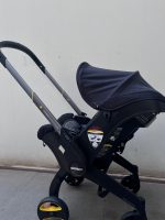 Xe đẩy kết hợp ghế ngồi ô tô Doona màu đen, tặng kèm đệm xe đẩy và miếng lót ô tô (1,8→13,6kg, còn túi đựng) - Ảnh 20