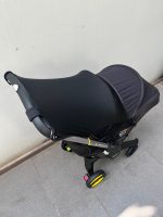 Xe đẩy kết hợp ghế ngồi ô tô Doona màu đen, tặng kèm đệm xe đẩy và miếng lót ô tô (1,8→13,6kg, còn túi đựng) - Ảnh 31