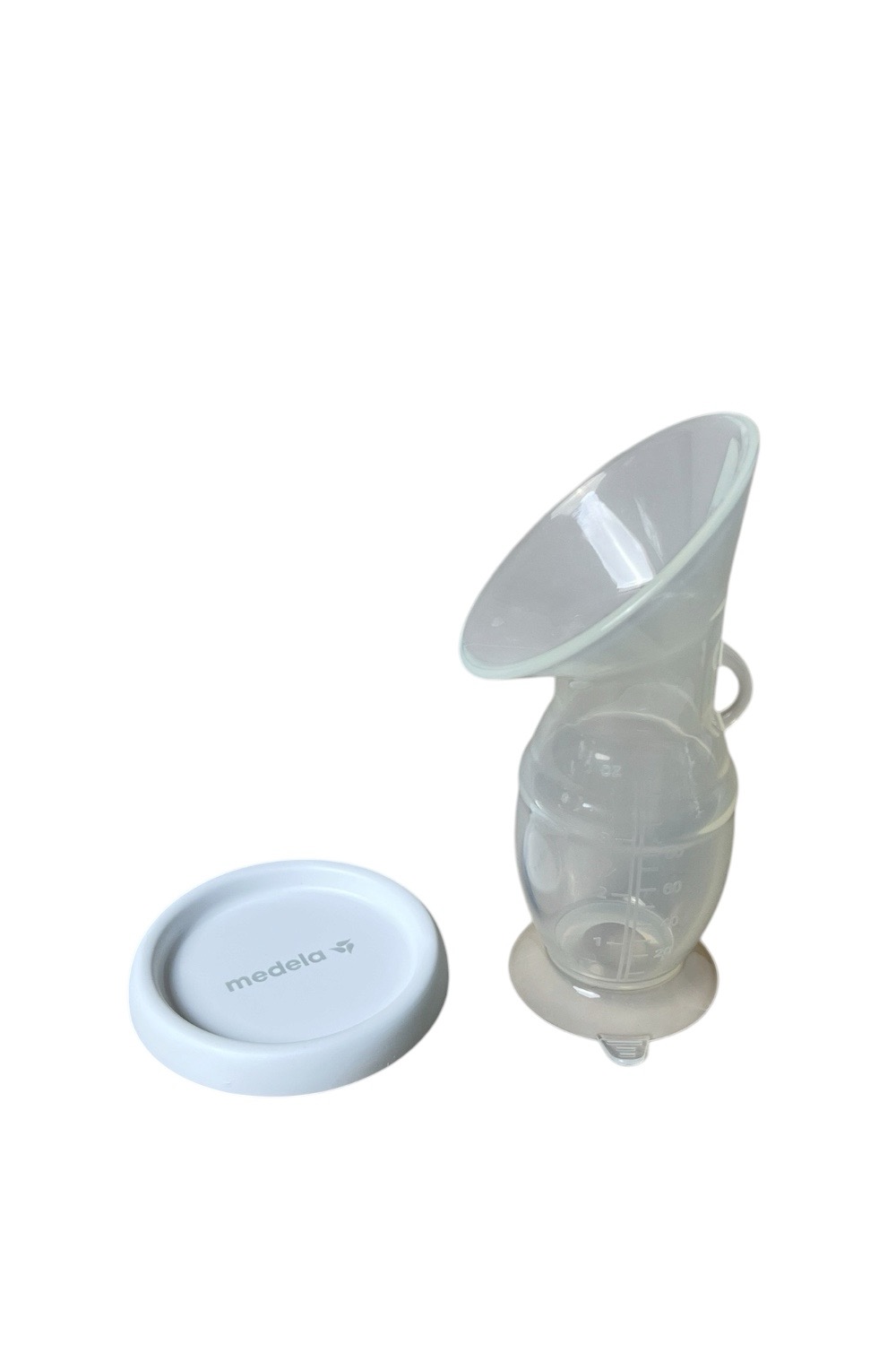 190e2f60f7ec40899217bcf2f4a744ed Cốc Hứng Sữa Silicon Medela ( no box) - Ảnh 1