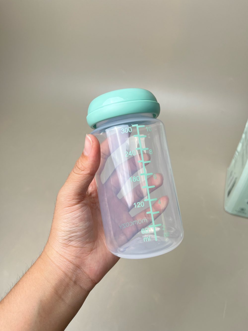 Bình trữ lạnh sữa Momcozy 22oz màu xanh ( full box) - Ảnh 10