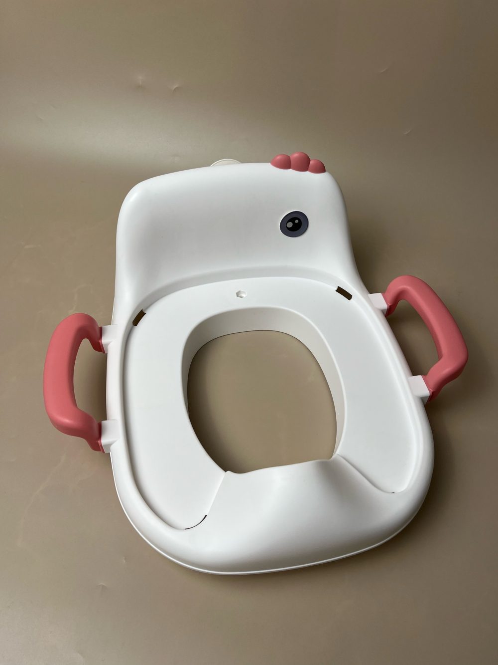 Bệ thu nhỏ đi vệ sinh cho bé Munie hình chú vịt màu hồng ( size: 10m+) - Ảnh 7